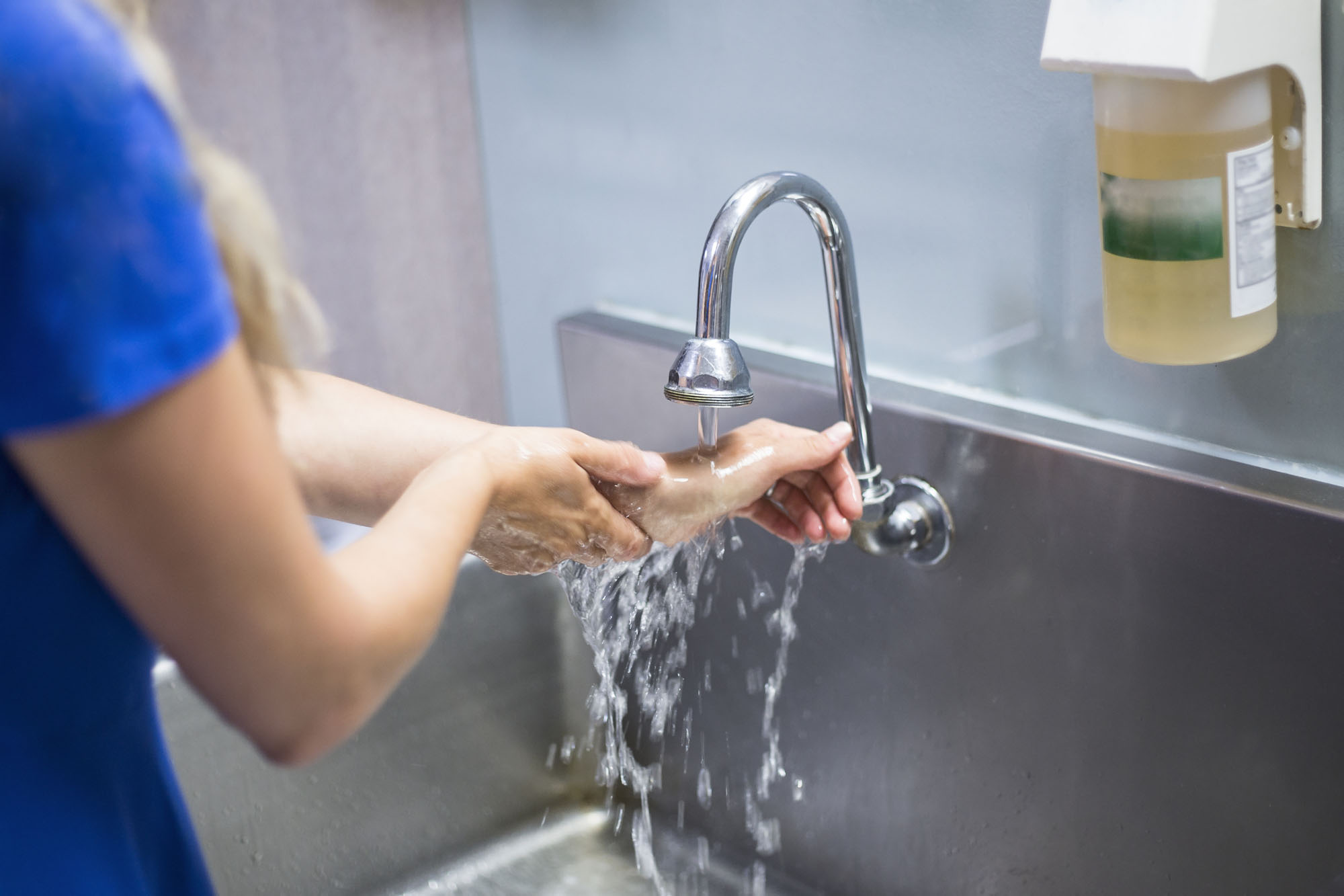 Female Nurse Washing Hands